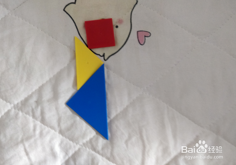 用七巧板智力拼图怎么拼一个跑着的娃娃