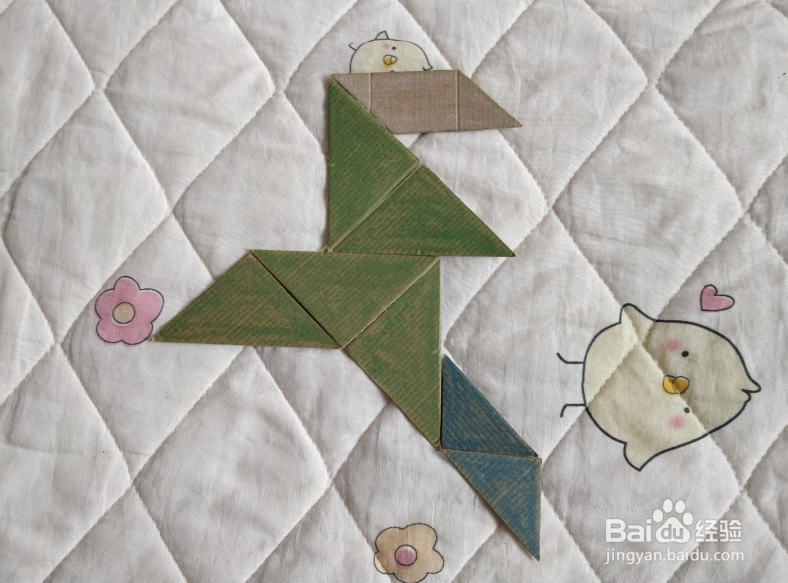 用九巧板怎么拼一个终点冲刺的小哥哥呢？