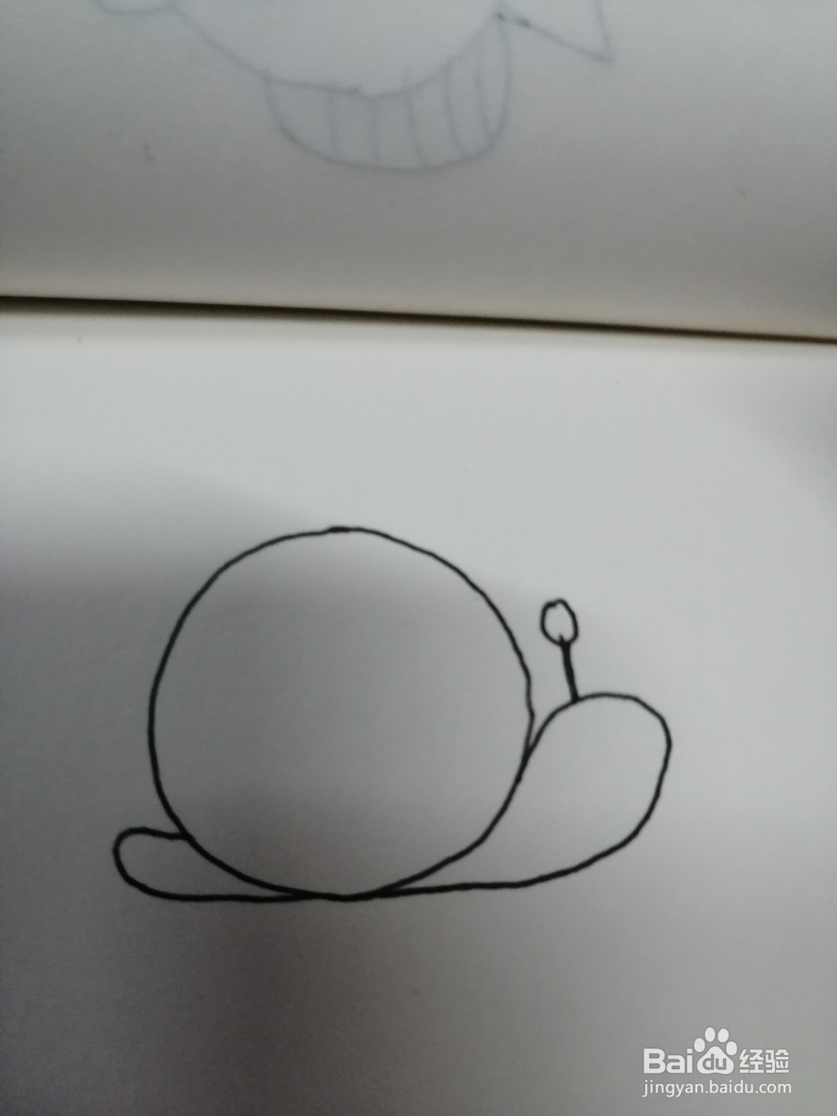 如何用圆形画出可爱的简笔画蜗牛？