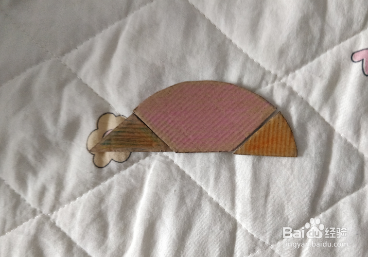 用蛋形九巧板怎么拼一只卧着休息的鸟