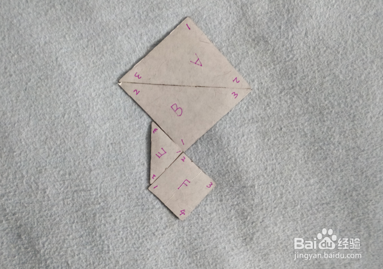 用七巧板怎样拼一只放飞的风筝？