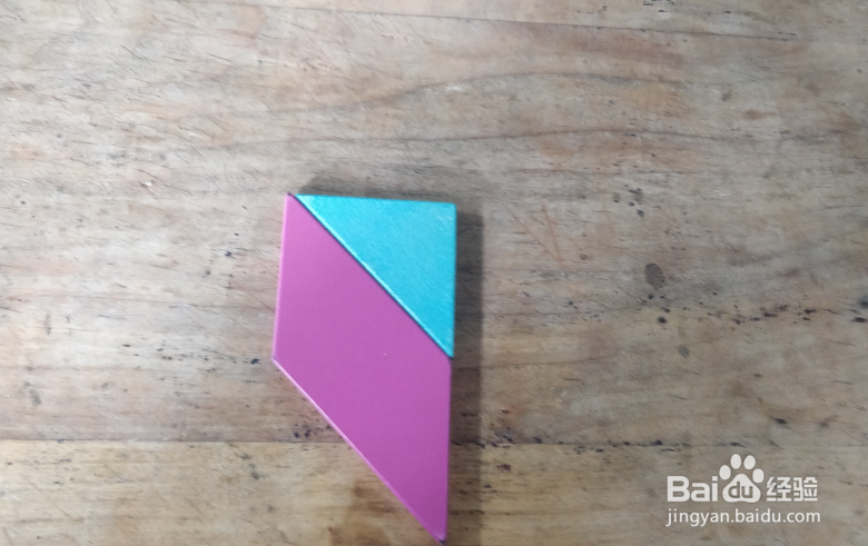 用七巧板怎样拼坐摇摇车的小孩儿