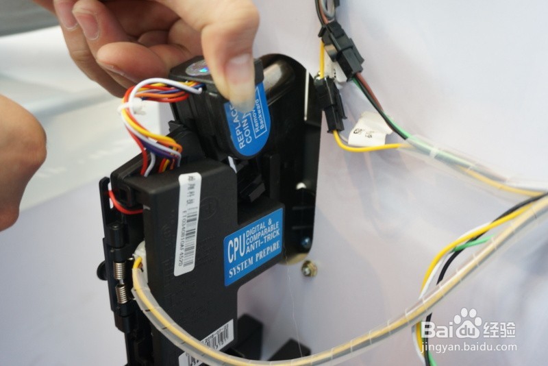 新买的儿童游艺机如何夹好游戏币呢