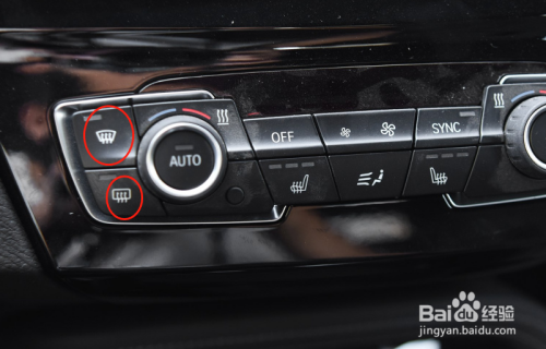 上下按钮分别为前挡风玻璃加热以及后挡风玻璃除雾.