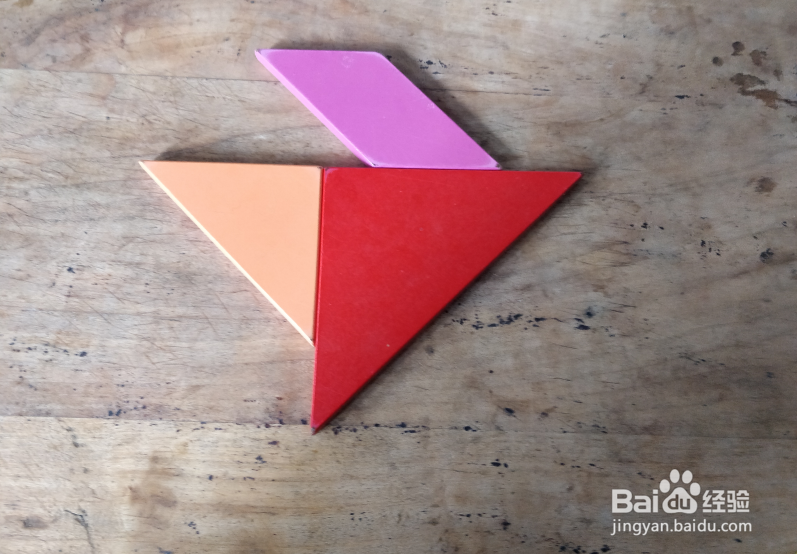 用七巧板怎样拼一只游泳的企鹅?