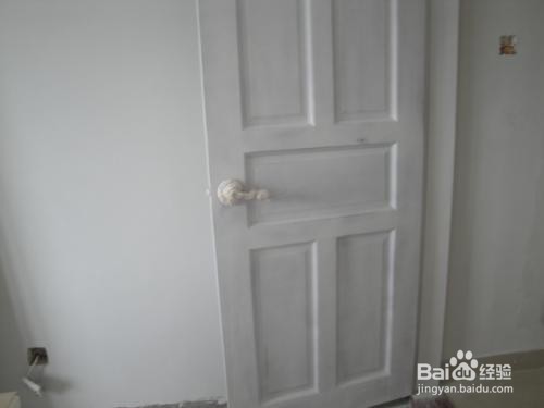 门被喷油漆后怎么洗掉