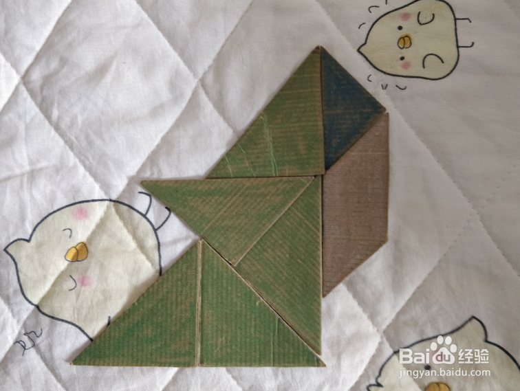 用九巧板怎么拼一个正在讲课的老师呢?