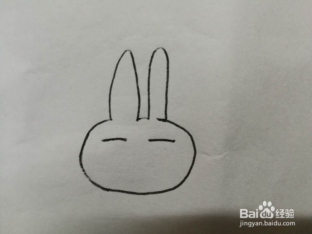 简笔画无奈的兔子