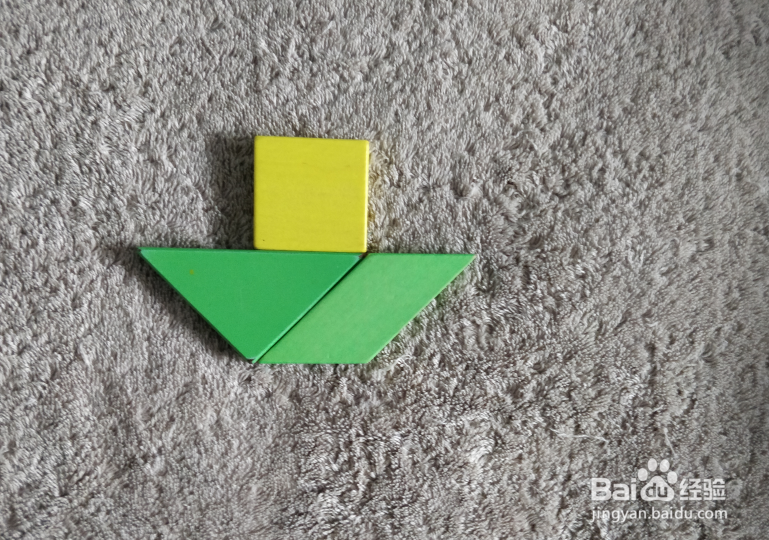 用七巧板怎样拼一只红酒起子？