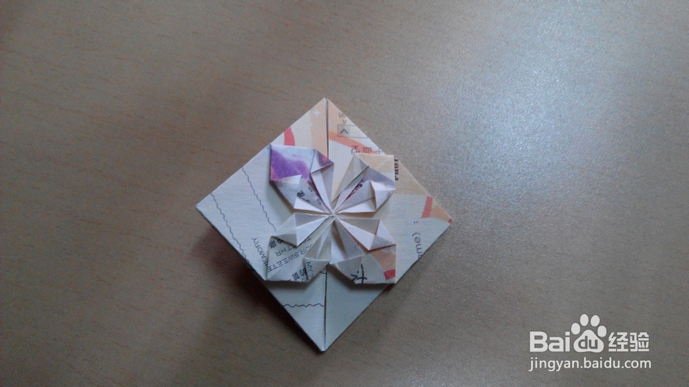 利用纸币或者折纸折一颗心的折法