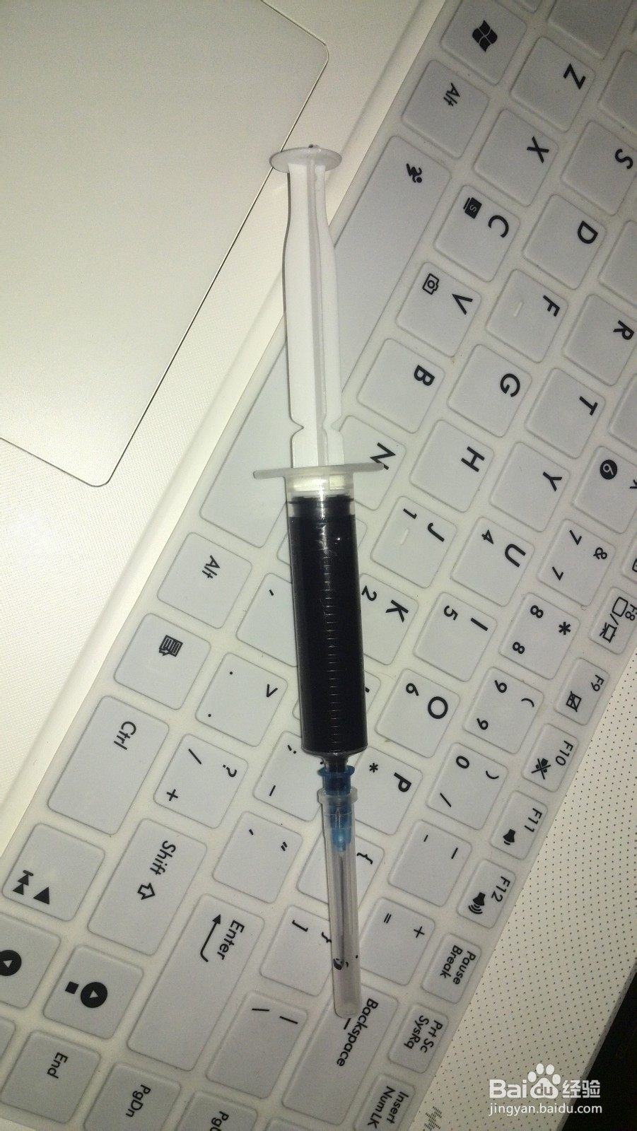 佳能815黑色墨盒加墨流程