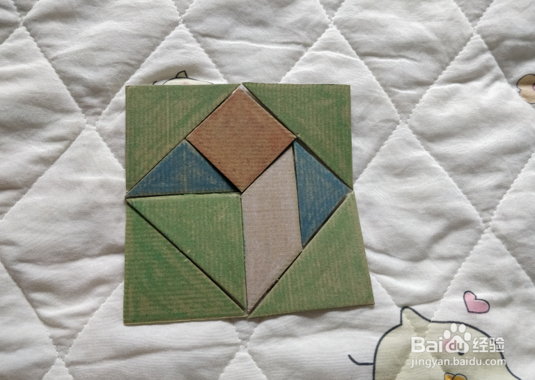 用九巧板怎么拼一个终点冲刺的小哥哥呢？