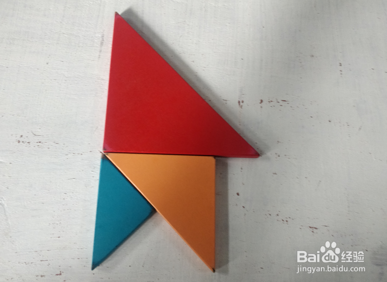 用七巧板怎样拼一只四脚挨地站着的猴子?