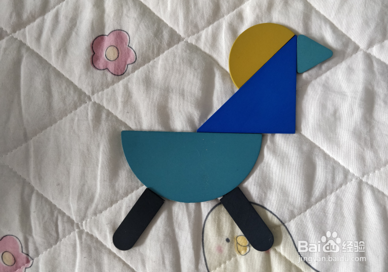 用形状积木怎么拼一只木马？