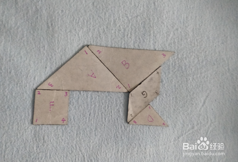 用七巧板怎样拼一头站着的犀牛？