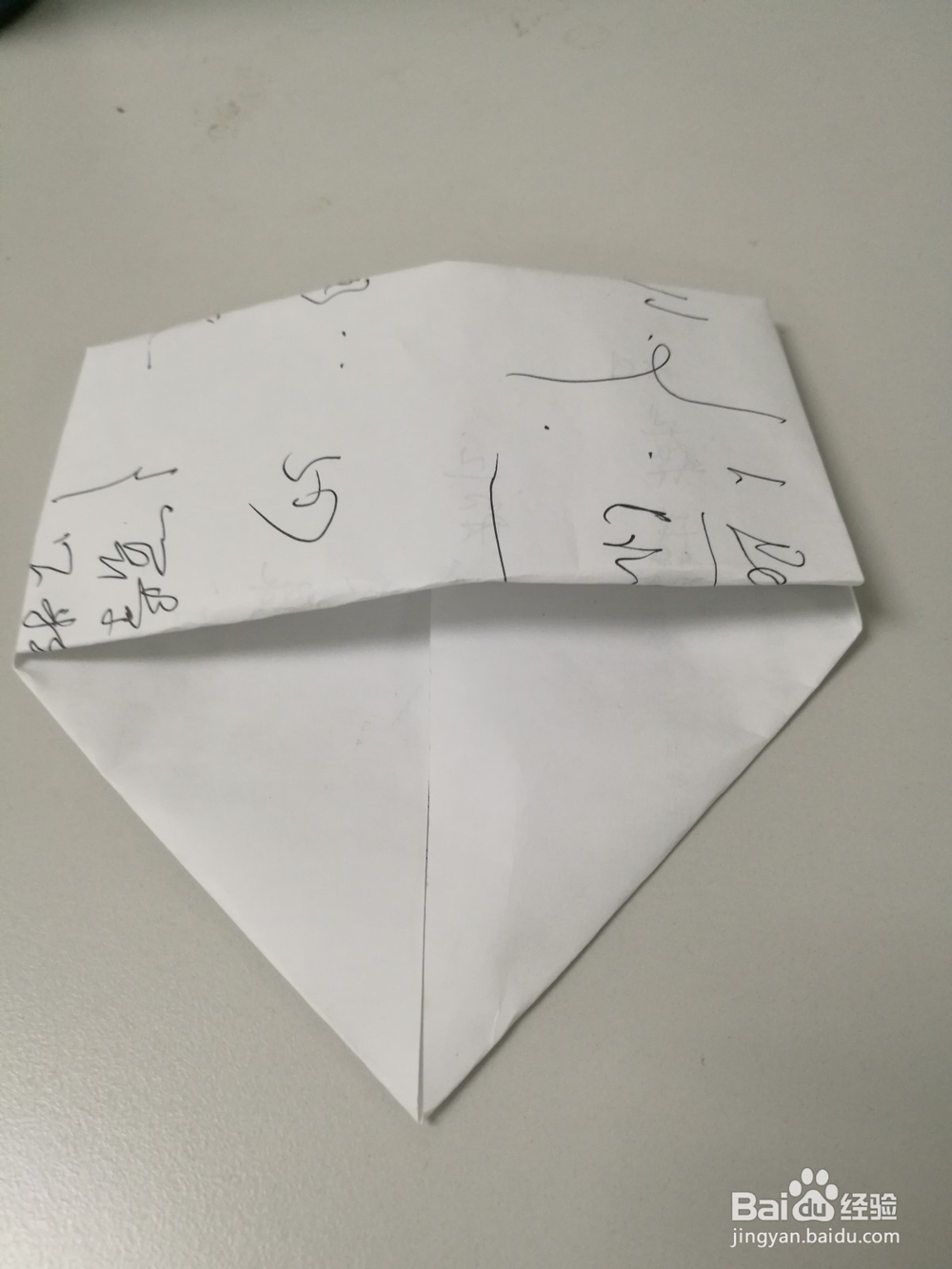 用纸折一个简单的钱包，给小孩子玩玩