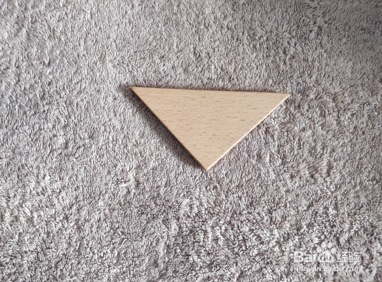 跳草裙舞的小哥哥用七巧板怎么拼