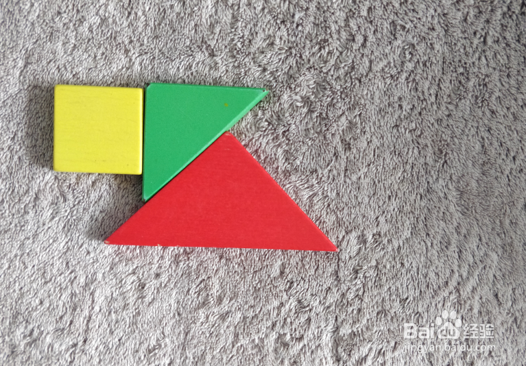 用七巧板怎样拼一只奔跑的狗？