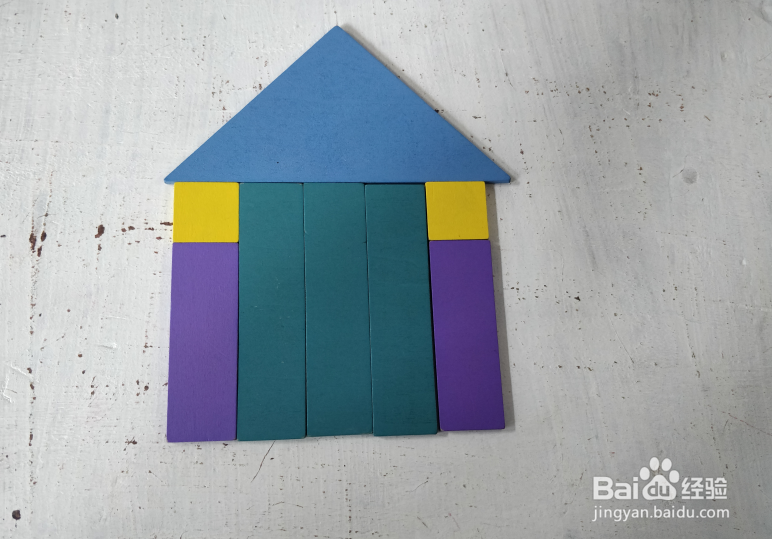 用智力拼板怎样拼一座木屋?