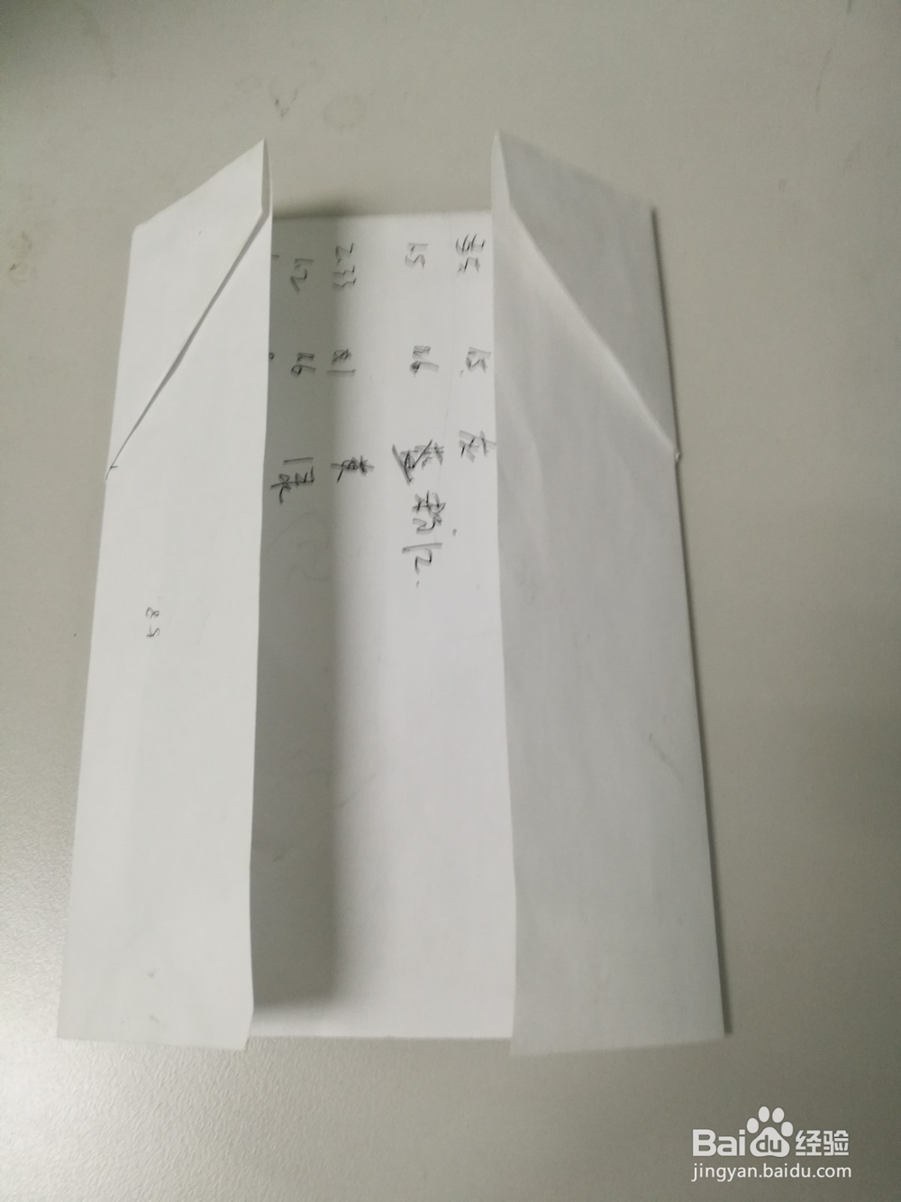 用纸折一个简单的钱包，给小孩子玩玩