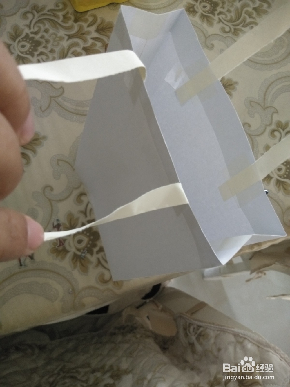 幼儿园手工怎么用A4纸做环保购物袋