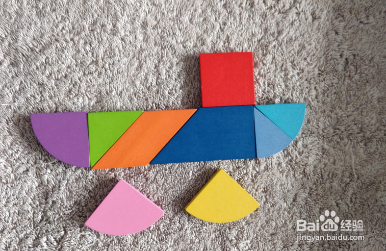 用九巧板拼图玩具怎样拼一艘货轮?