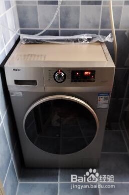 海尔洗衣机中途添衣怎么开门