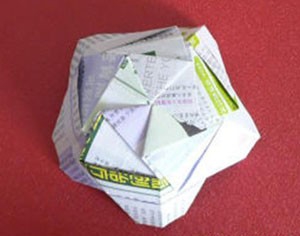 教你用A4纸折成花瓣式纸盒 图解