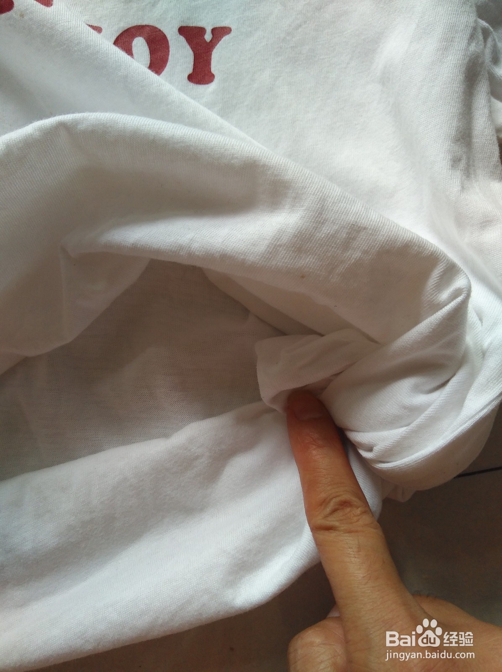 衣服怎么卷露肚脐