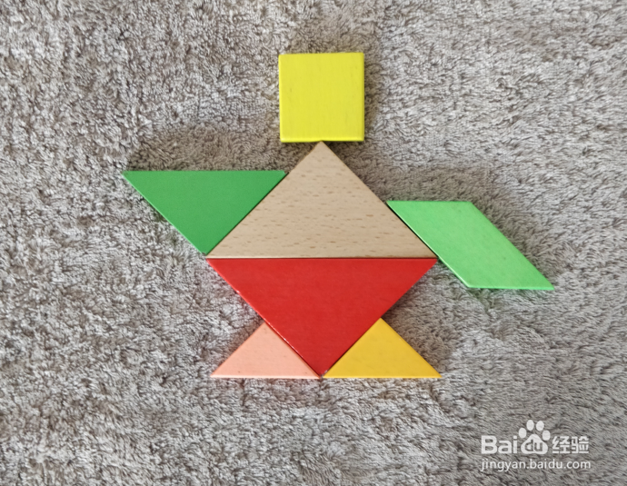 用七巧板怎么拼一把高端油壶呢?