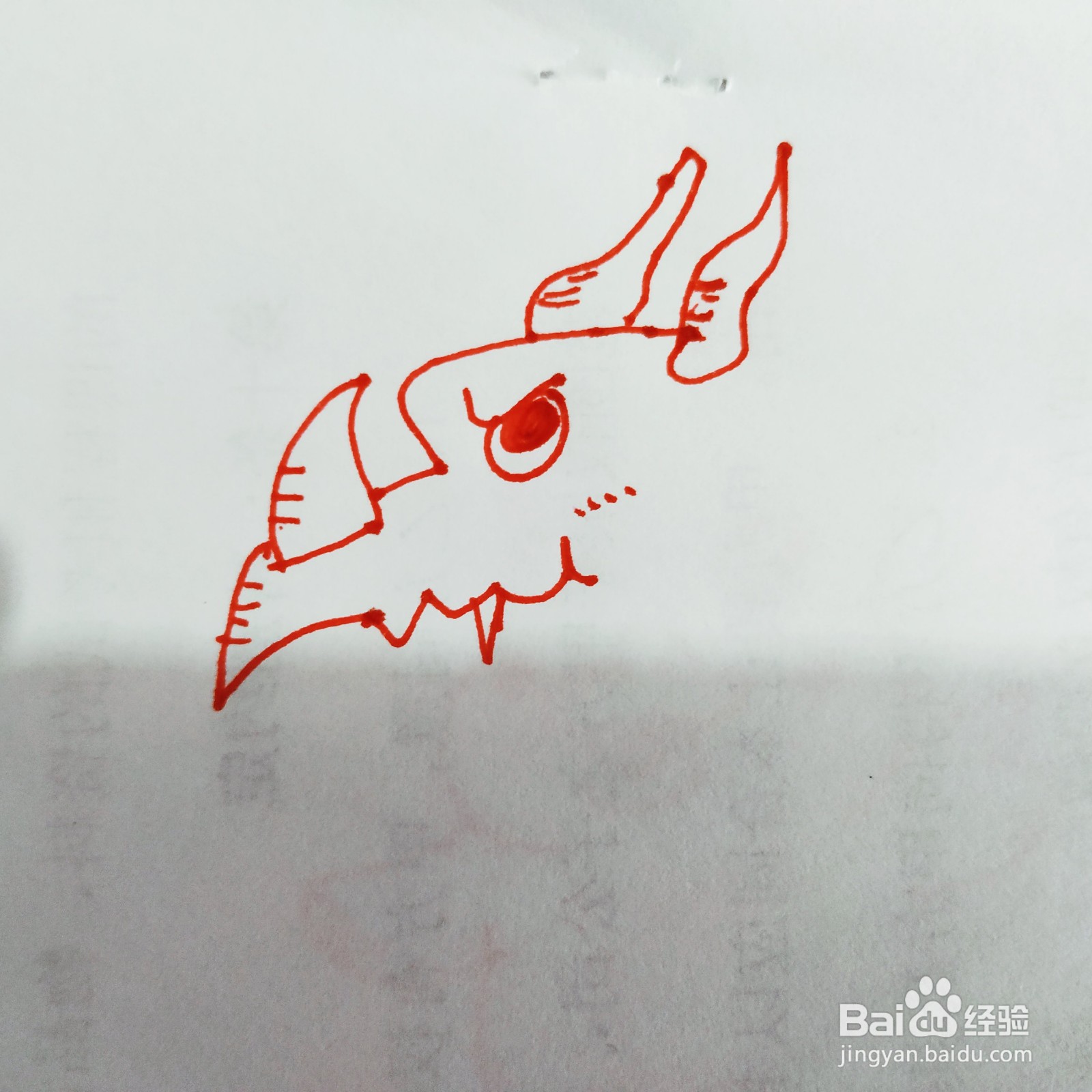 如何来画一只凶猛的大恐龙简笔画呢