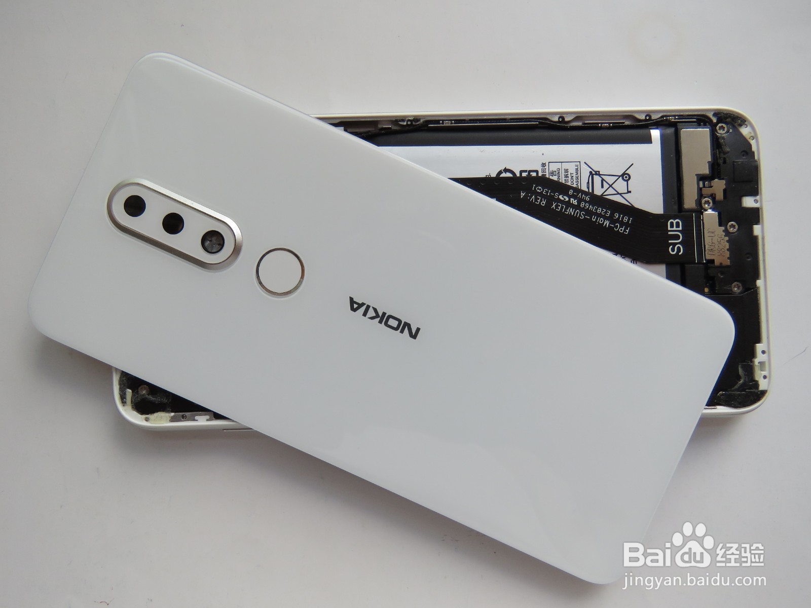 如何更换诺基亚手机的尾插小板？