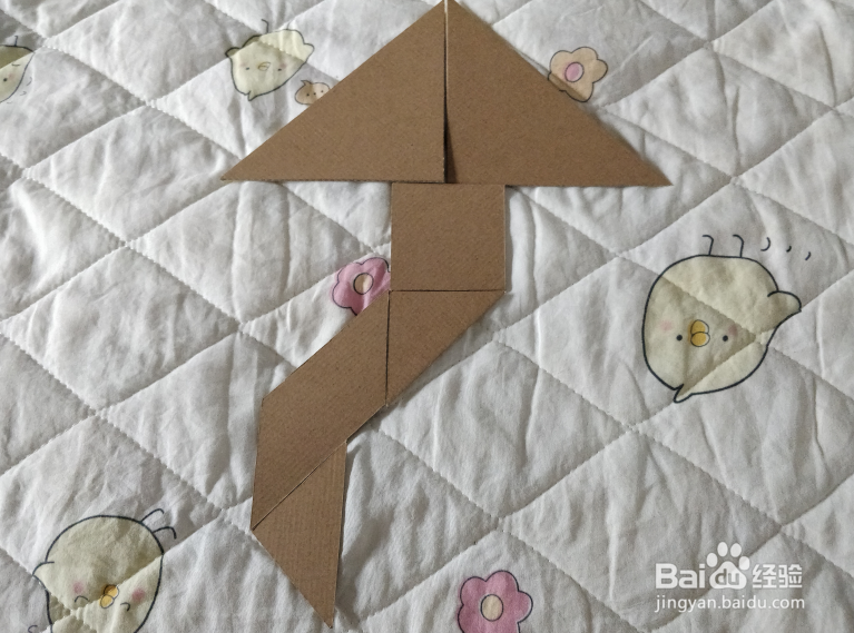 用七巧板怎么拼一只飞在空中的风筝呢？