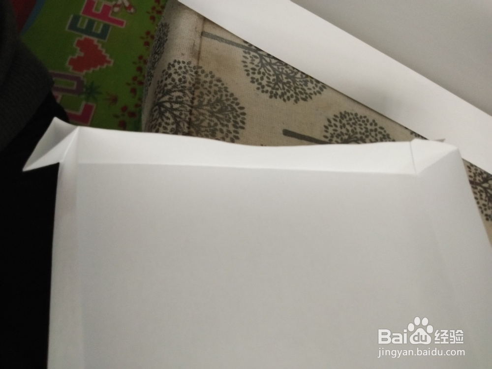 幼儿园手工怎么用A4纸做环保购物袋