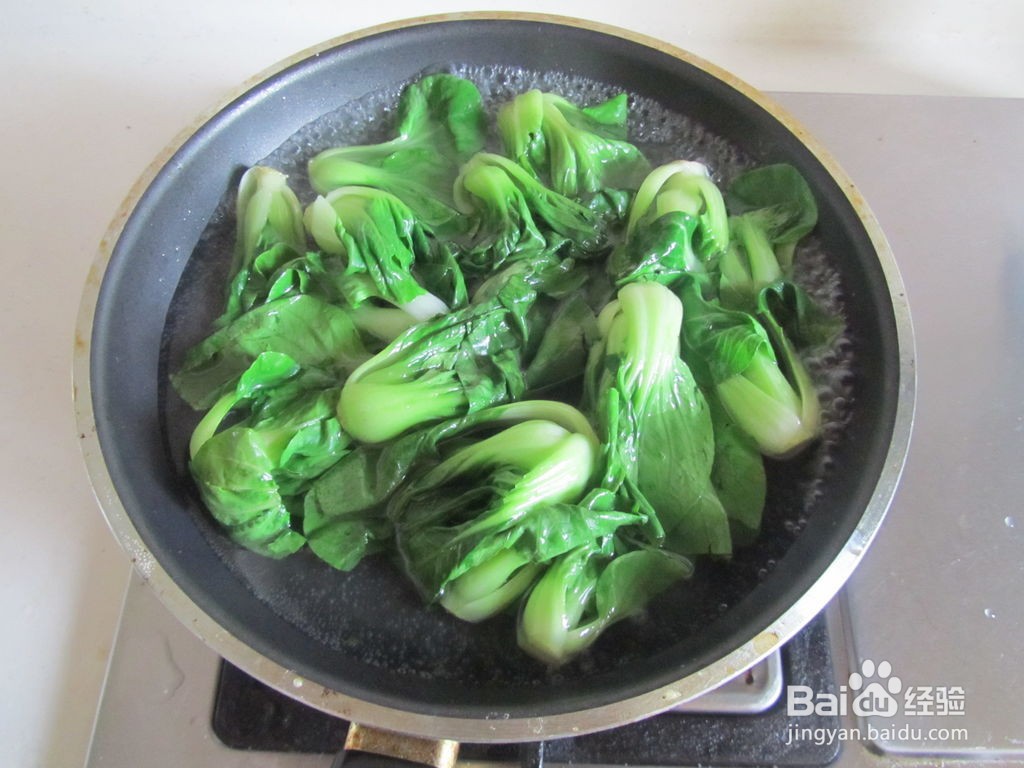 草菇焖鸡丸的做法