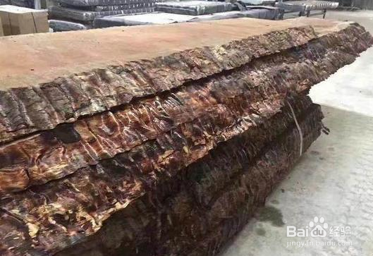 千年原木运回国内，切割制作成一块大板值不值？