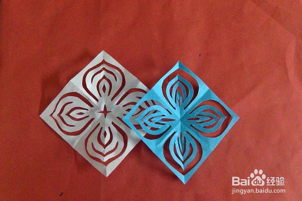 怎样剪边框四瓣花？对称花瓣花样