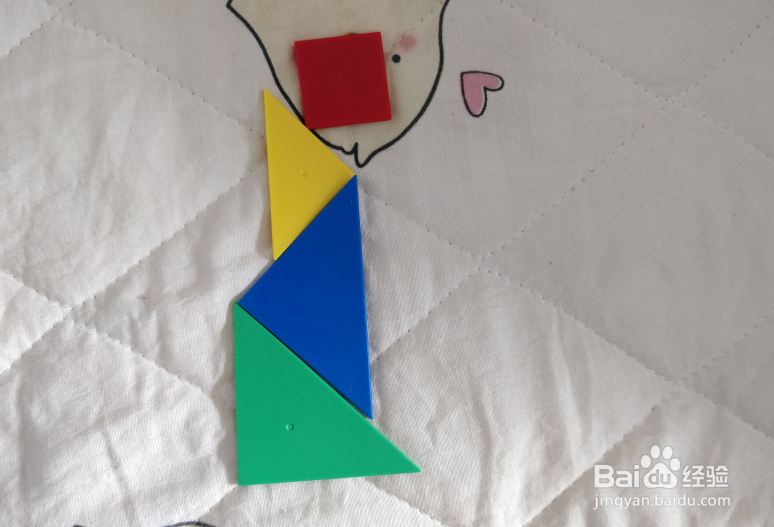 用七巧板智力拼图怎么拼一个跑着的娃娃