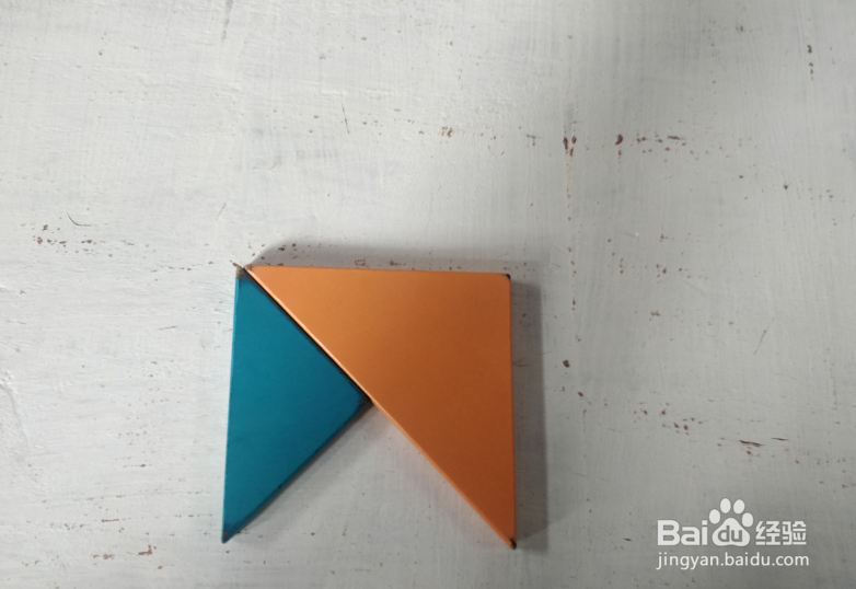 用七巧板怎样拼一只四脚挨地站着的猴子?