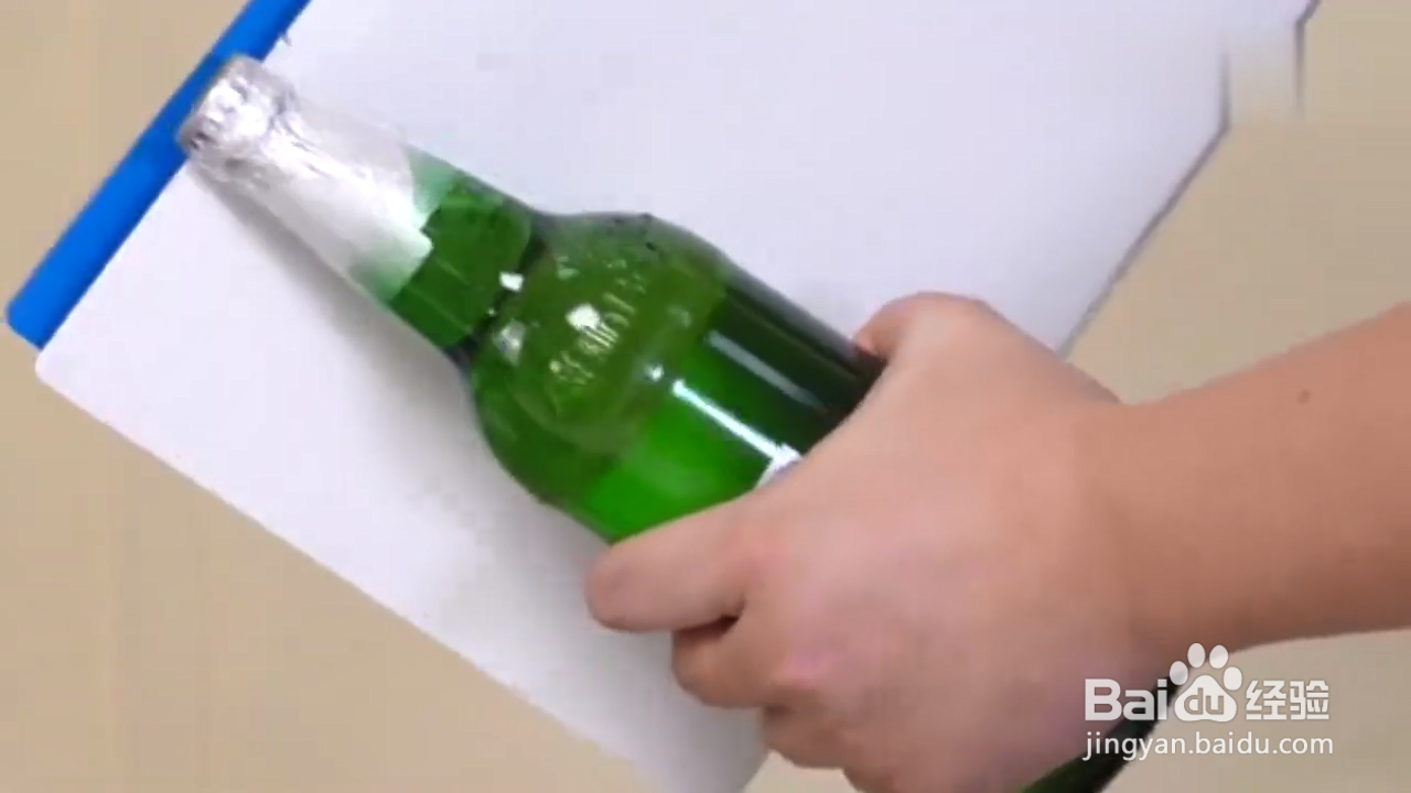 怎样打开啤酒瓶盖？