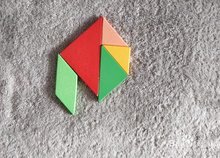 用七巧板怎样拼一个拄拐杖登山的人
