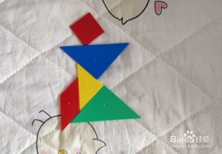 用七巧板智力拼图怎么拼一个大步奔跑的女孩？