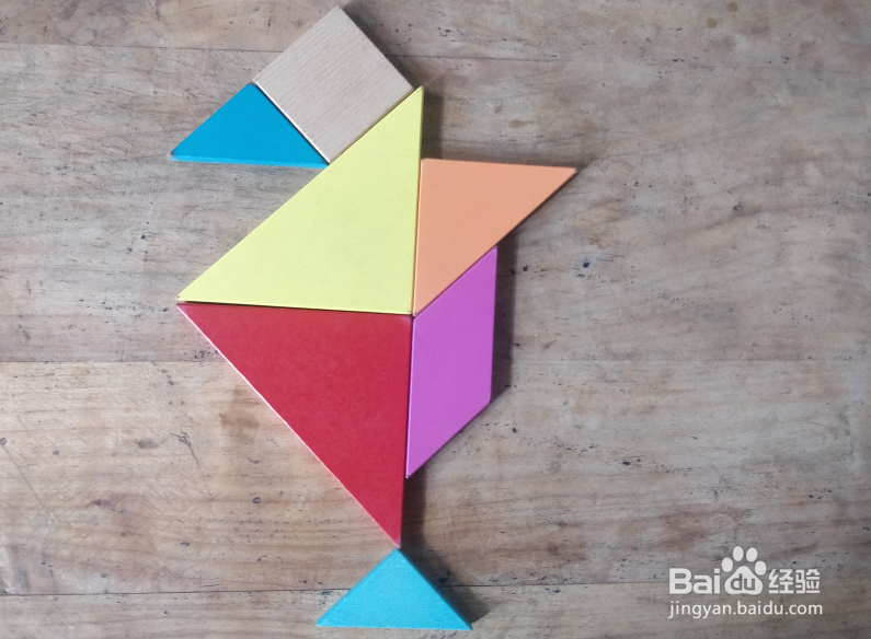 用七巧板怎样拼一只兴奋拍打鳍肢的企鹅?