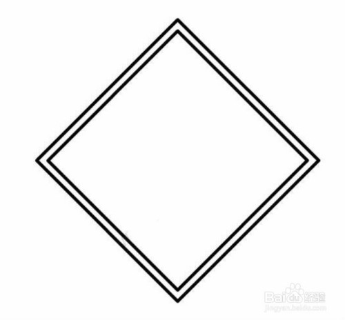 首先,在纸张上画一个菱形