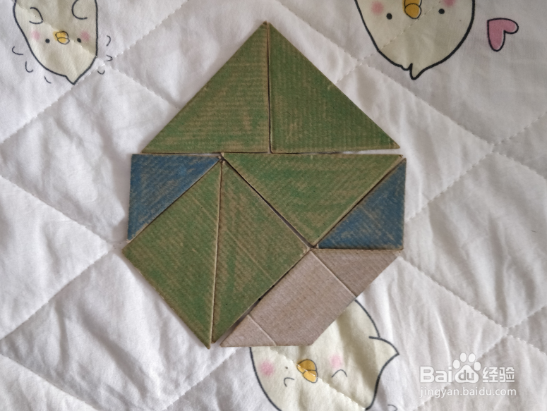 用九巧板怎么拼一个花骨朵呢?