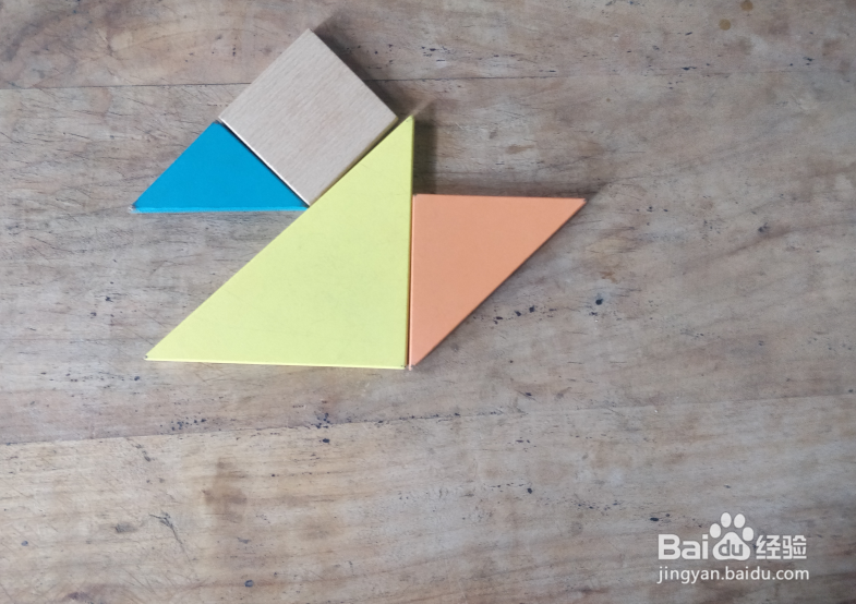 用七巧板怎样拼一只兴奋拍打鳍肢的企鹅?