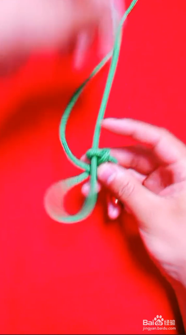 女士项链吊坠打结方法