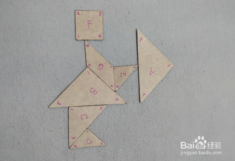 用七巧板怎样拼一个拿着伞的小女孩?