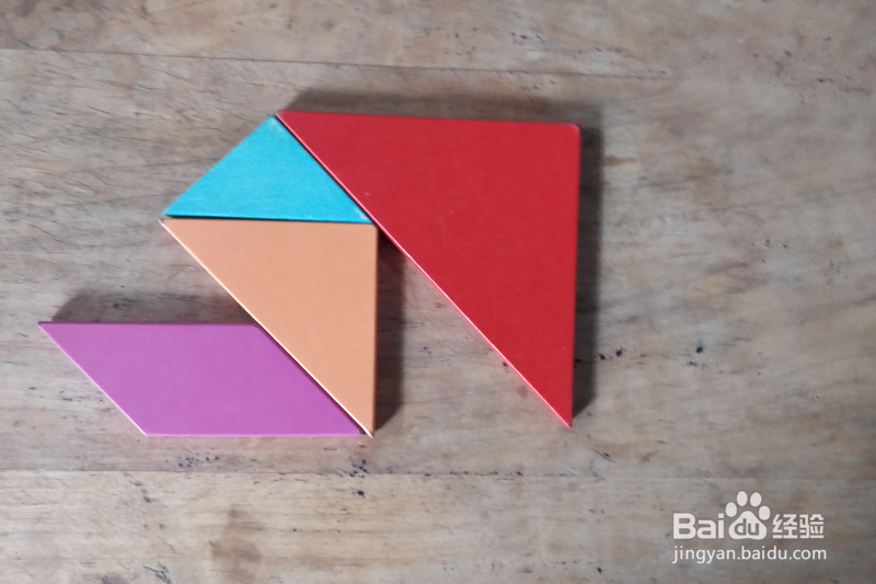 用七巧板怎样拼一个跪着擦地板的保洁员?