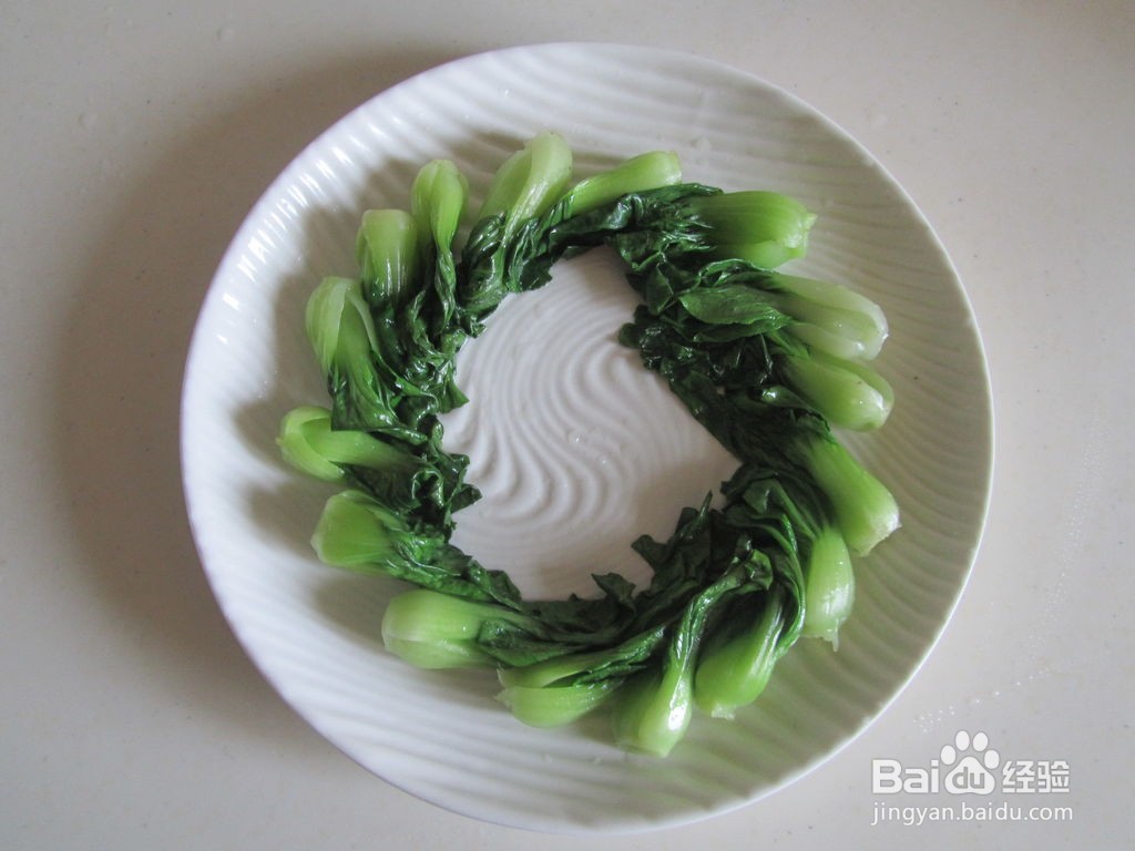 草菇焖鸡丸的做法